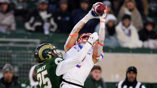 Nov 29, 2019; Fort Collins, CO, USA; Boise State Broncos wide receiver Khalil Shakir (2) pulls in a reception over Colorado State Rams cornerback Keevan Bailey (25) in the fourth quarter at Sonny Lubick Field at Canvas Stadium. Mandatory Credit: Ron Chenoy-USA TODAY Sports